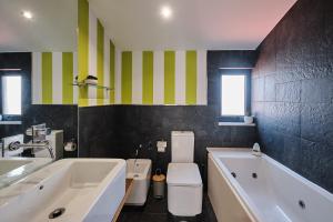 Koupelna v ubytování Faro de Corrubedo by Serendipia Turismo