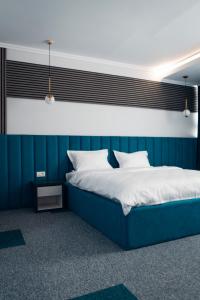 Postel nebo postele na pokoji v ubytování Ora Hotel