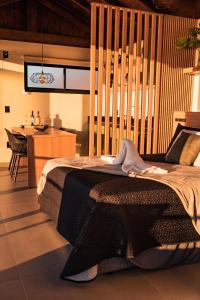 Postel nebo postele na pokoji v ubytování Villa do Sol Bangalôs