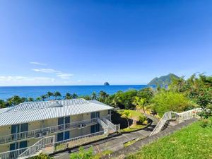 Mynd úr myndasafni af Ginestoo - appartement vue mer, piscine, mer à pied í Le Diamant