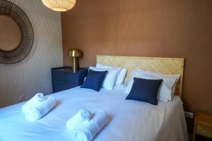 Postel nebo postele na pokoji v ubytování Le Clos de St Val 1