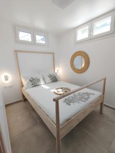 Ένα ή περισσότερα κρεβάτια σε δωμάτιο στο Fos residence