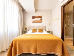 Postel nebo postele na pokoji v ubytování Dormavalencia Hostel Regne