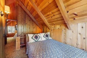 Ένα ή περισσότερα κρεβάτια σε δωμάτιο στο Wooded Comfort