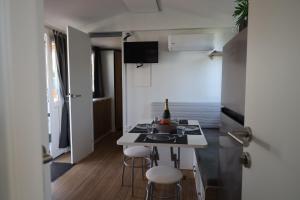 TV a/nebo společenská místnost v ubytování Camping Village Lido di Classe