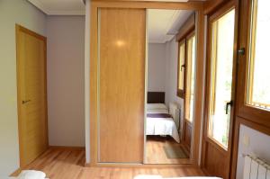 Postel nebo postele na pokoji v ubytování Apartamentos el Rincon de Limes