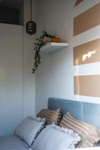 Giường trong phòng chung tại Terra Green 2