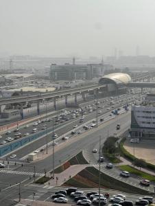 a highway filled with lots of traffic in a city at sara apartment in Dubai