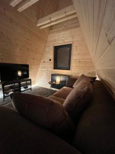 Posezení v ubytování Azalea Chalet