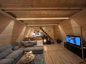 Posezení v ubytování Azalea Chalet
