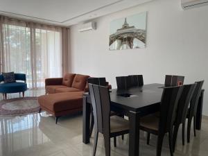 Svetainės erdvė apgyvendinimo įstaigoje Franyah résidence