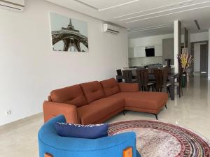 Svetainės erdvė apgyvendinimo įstaigoje Franyah résidence