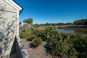 a view of a river from the side of a house at 815 Treeloft Cottage in Seabrook Island