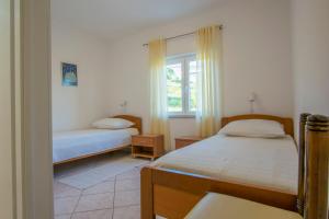 Katil atau katil-katil dalam bilik di Apartments Olga +73 gambar