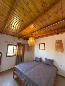 Ένα ή περισσότερα κρεβάτια σε δωμάτιο στο B-Tusca Homes - تسكَّنَ +50 φωτογραφίες