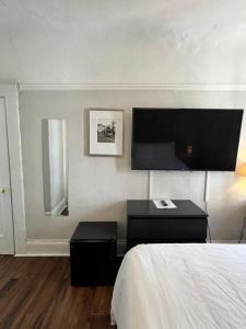 Tempat tidur dalam kamar di Hotel Ikon