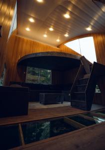 a lobby with a spiral staircase in a building at Azure Lagoon Resort 