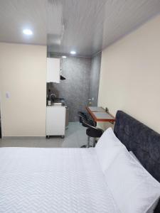 Apartaestudio Casablanca Choachí客房内的一张或多张床位