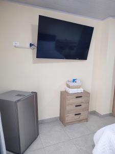 Apartaestudio Casablanca Choachí的电视和/或娱乐中心