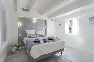 Ένα ή περισσότερα κρεβάτια σε δωμάτιο στο Villa Baraka +25 φωτογραφίες