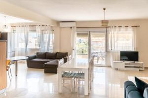 Μια τηλεόραση ή/και κέντρο ψυχαγωγίας στο 3 Bedroom Apartment, Easy Parking