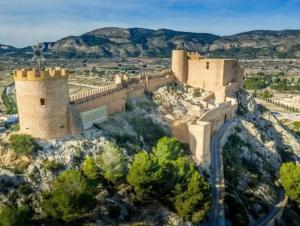 an aerial view of a castle on a mountain at EL CHORRO Aire acondicionado Bar privado Barbacoa Amplios patios in Castalla