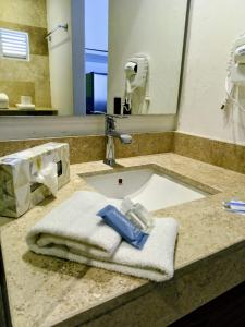 Koupelna v ubytování Hotel Calypso Cancun