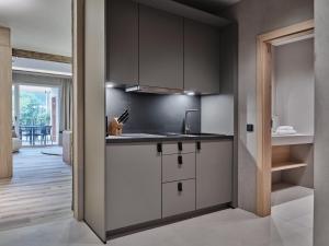 Kuchyň nebo kuchyňský kout v ubytování Hotel Garni Pinzgau, Fabian Hüttl