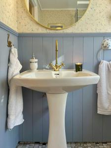 Ένα μπάνιο στο Charming Southern Style House Near Arendal