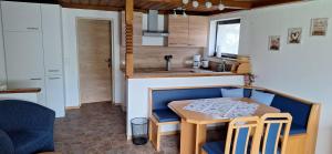 Kuchyňa alebo kuchynka v ubytovaní Chalet Anna Appartment