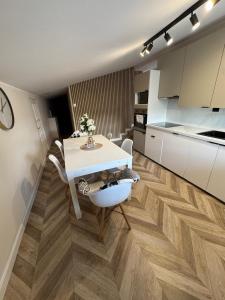 Kuchyň nebo kuchyňský kout v ubytování Pokoje gościnne Venezia