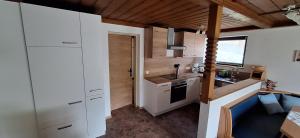 Kuchyňa alebo kuchynka v ubytovaní Chalet Anna Appartment