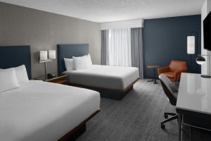 Postel nebo postele na pokoji v ubytování Courtyard by Marriott Atlanta Buckhead