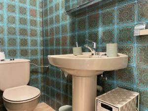 Koupelna v ubytování Amplio piso con garaje en Boiro + 10 fotografií