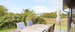 A garden outside Beachclose Log Cabin On Mors With A View