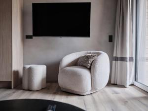 TV a/nebo společenská místnost v ubytování Hotel Garni Pinzgau, Fabian Hüttl