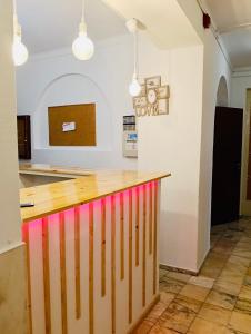 a kitchen with a wooden counter in a room at Residencial Pimenta ,Portimao,Algarve in Portimão
