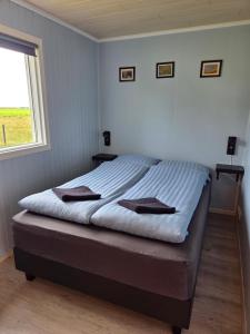 Postel nebo postele na pokoji v ubytování Núpakot