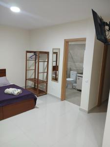 Postel nebo postele na pokoji v ubytování Nifa House