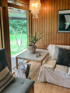 Χώρος καθιστικού στο Wooden Home By Beach Ideal For Swimming