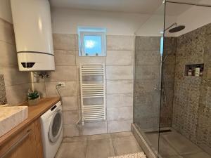 Koupelna v ubytování Corte Apartman