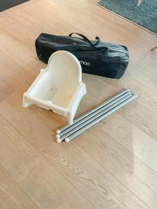 a plastic container sitting on the floor next to a bag at Stylish Mountain Cabin In Hallingdalen in Flå