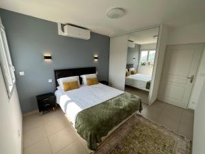 Ένα ή περισσότερα κρεβάτια σε δωμάτιο στο Jolie Appartement T3 Brive