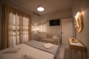 Archontiko Seaside Hotel客房内的一张或多张床位