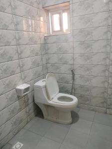 Ein Badezimmer in der Unterkunft Résidence Diakhaby