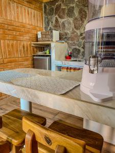 Kuchyň nebo kuchyňský kout v ubytování Watzara Wasi Apart Hotel Vacacional en Cotacachi + 37 fotografií
