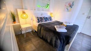 Voodi või voodid majutusasutuse Diamant Vert - Villa Bwa Lélé, entre mer & montagnes toas