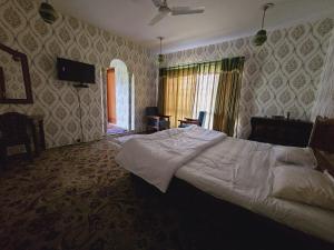 Letto o letti in una camera di The Citadel