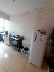 Kuchyň nebo kuchyňský kout v ubytování Hospedagem Domiciliar