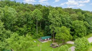 an overhead view of a house in the woods at Acorn Cottage at Hocking Vacations in Logan